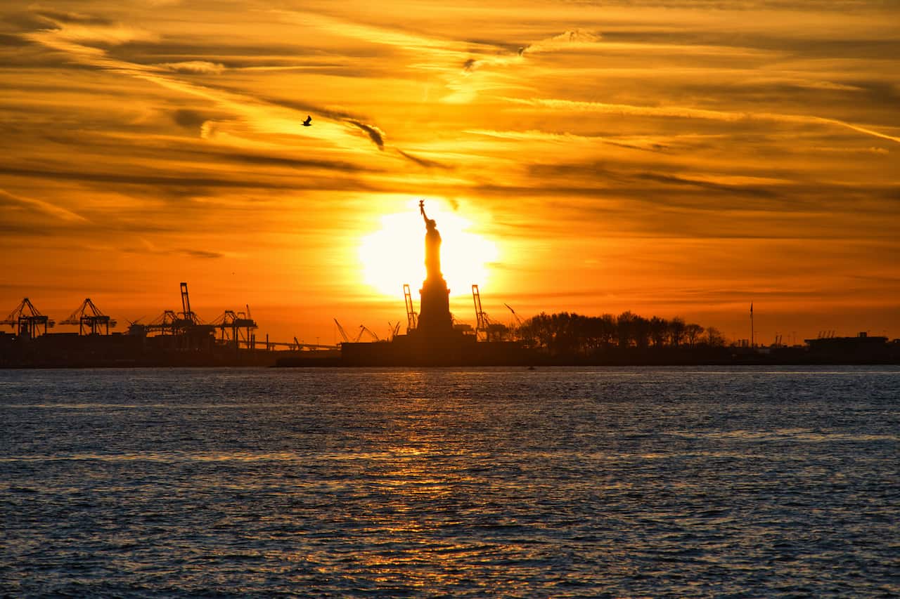 Sunset Behind Statue of Liberty